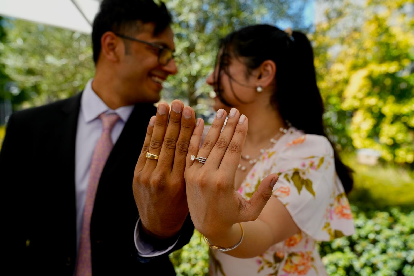 Saumya and Sameer showing their rings
