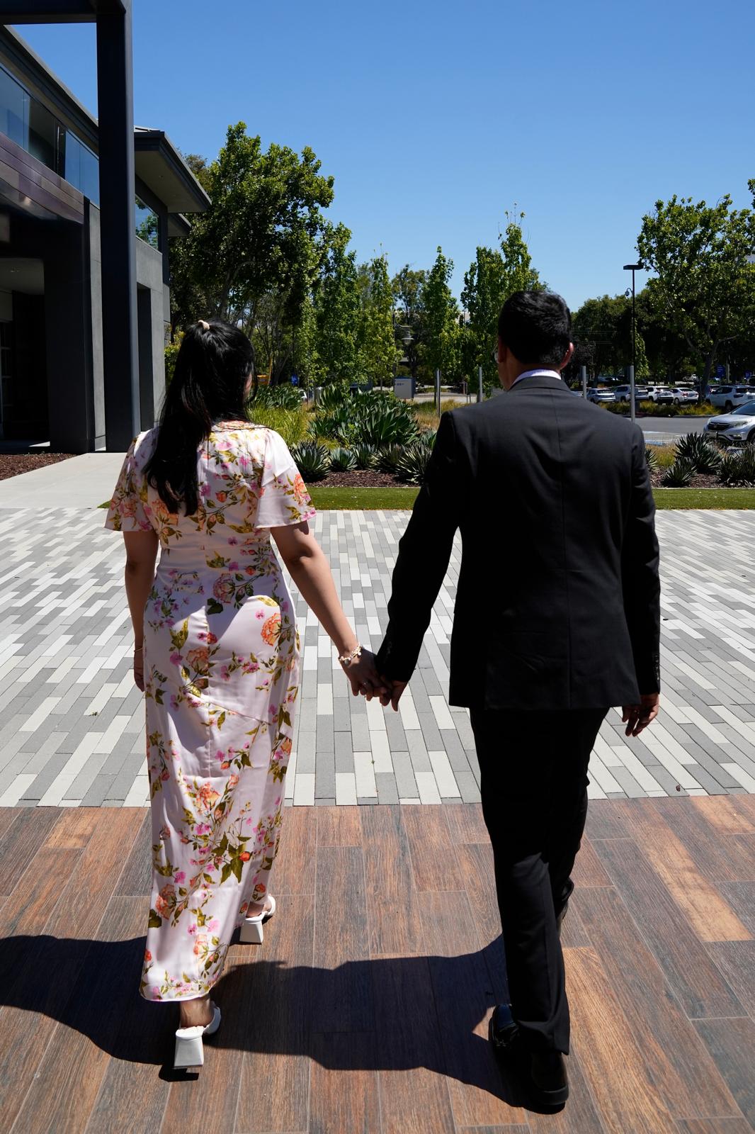 Saumya and Sameer walking hand in hand